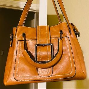 Beautiful brown leather bag with double straps